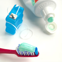 dental care basics of toothbrush, floss, and toothpaste